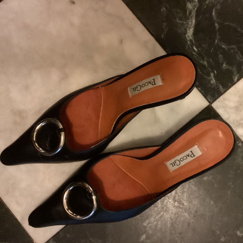 Paco Gil
 Black leather luxurious Mules with Metallic Accent.